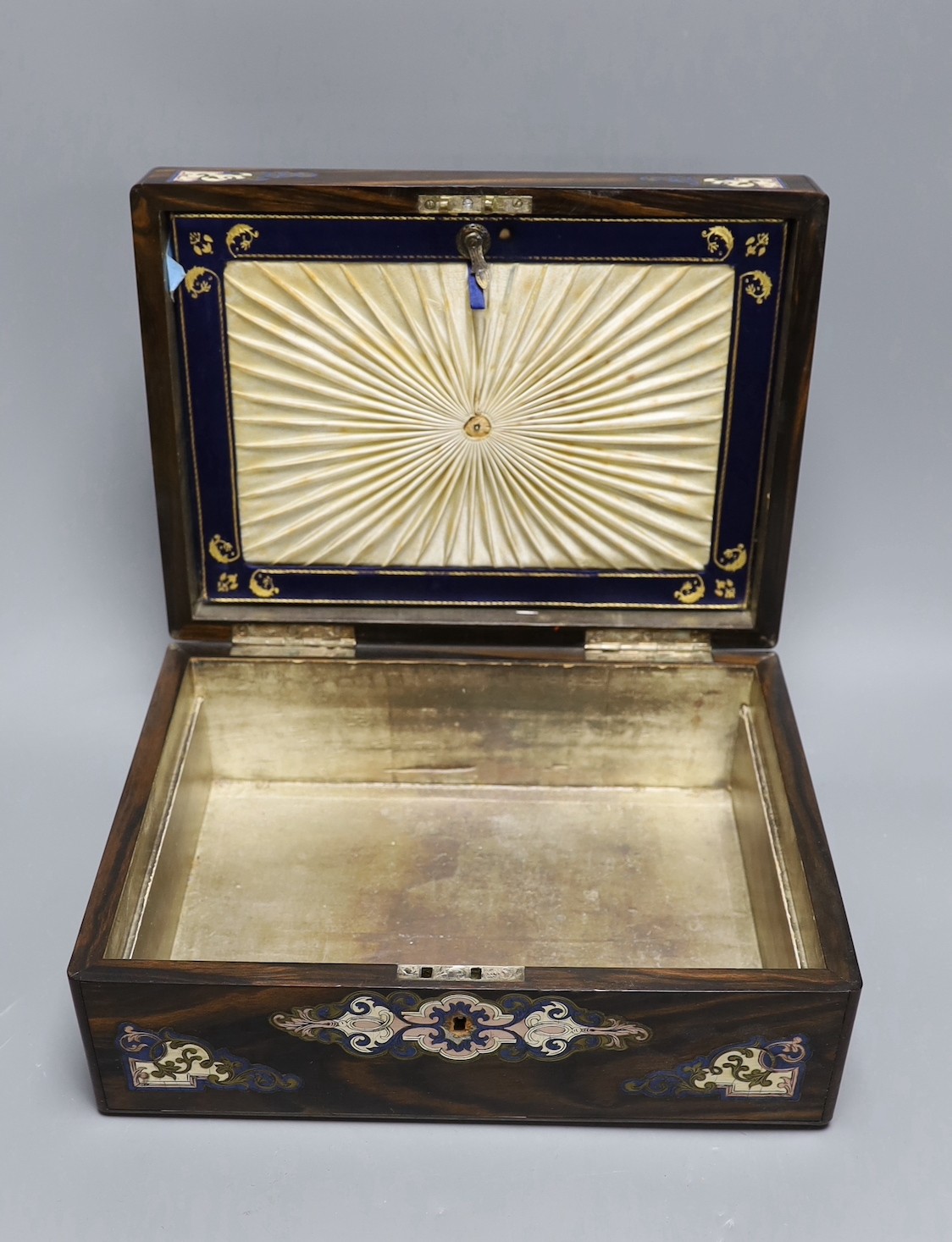 A French rosewood brass inlay and enamelled box, interior missing, 31 cms wide x 12 cms high